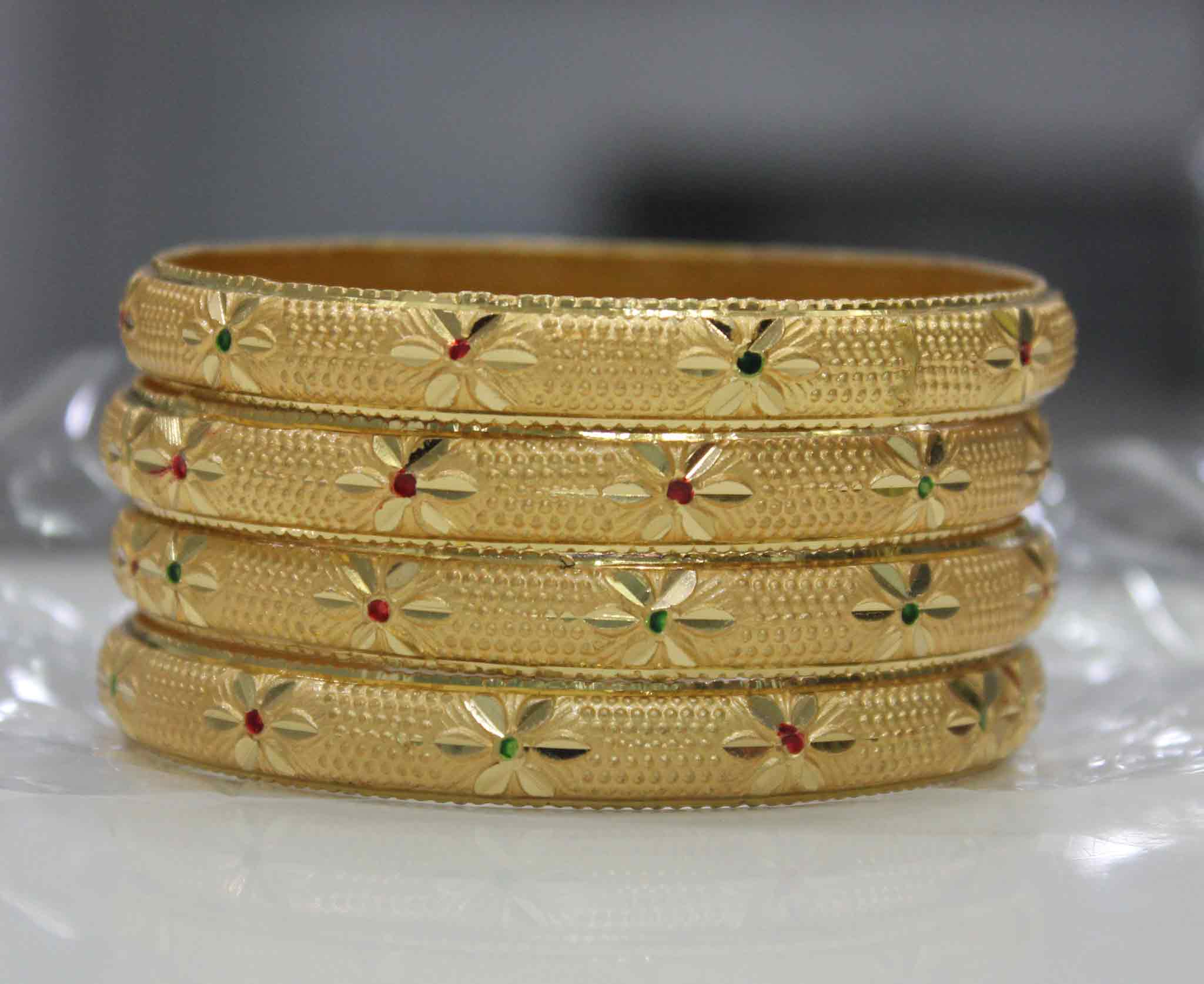 Beautiful Set Of 4 Gold Dyed Bracelets With Flower Design And Meenakari Work - Image 3