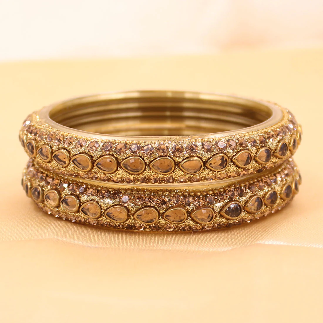 Pair of Golden Running Kundan Glass Bangles by Leshya - Image 3