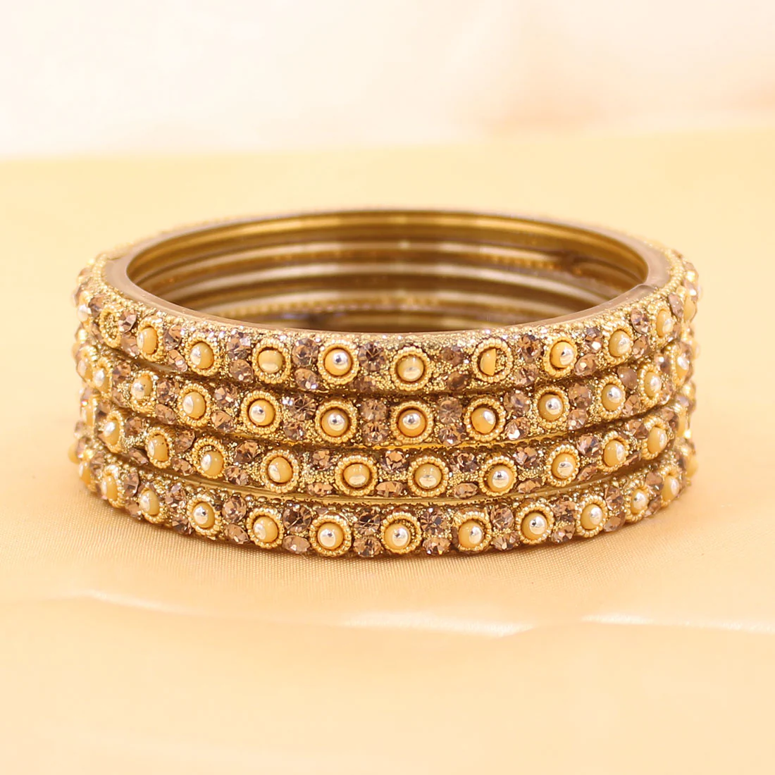 Set of 4 Golden Glass Bangles with Polki Beads by Leshya - Image 3