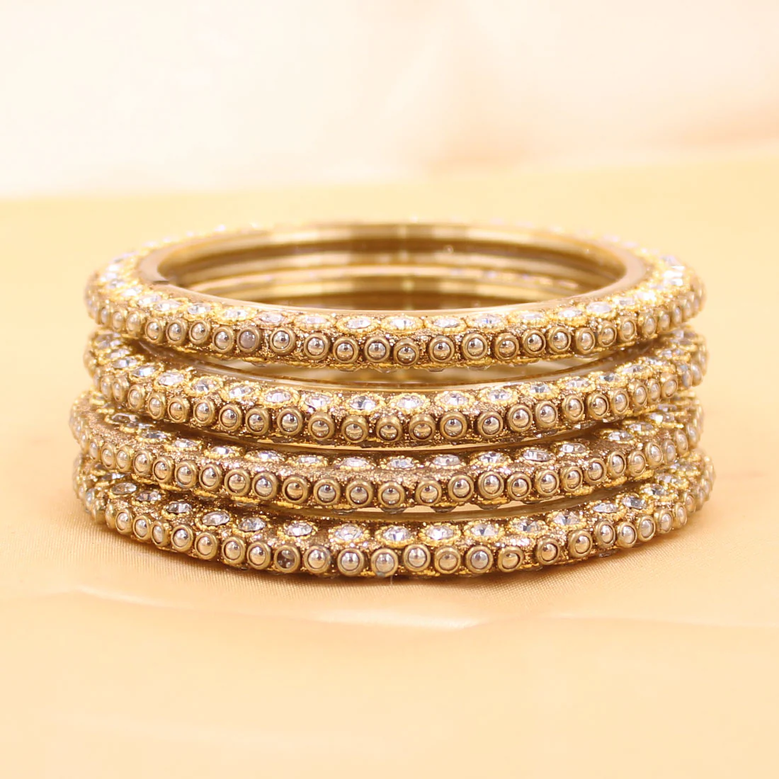 Set of 4 Glass Bangles with Running Golden Kundan by Leshya - Image 3