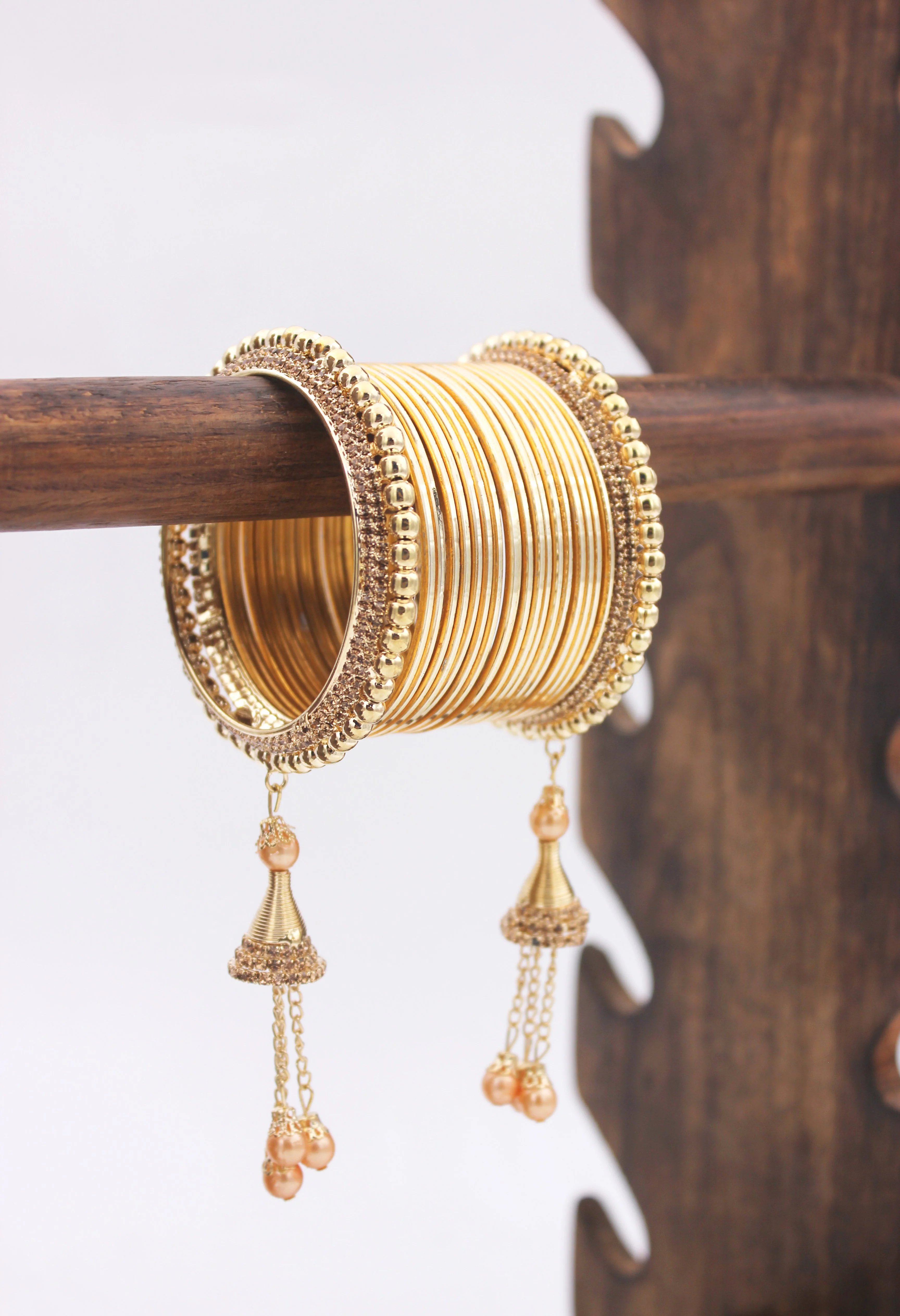 Golden Jhumki with Shining Metal Bangles by Leshya - Image 2
