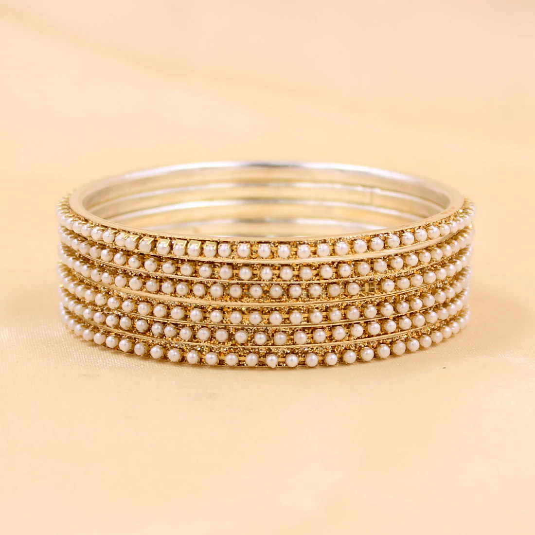Brass Based Bangles with Running White Bead by Leshya - Image 3