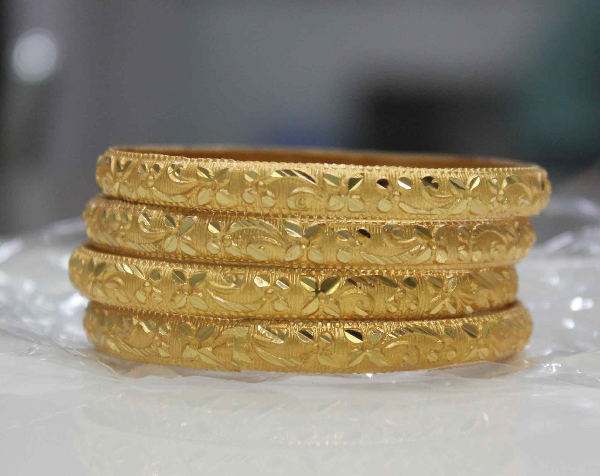Set Of 4 Gold Dyed Bracelets With Delicate Flower Patterns - Image 4